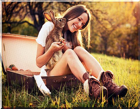 girl with rabbit as a pet